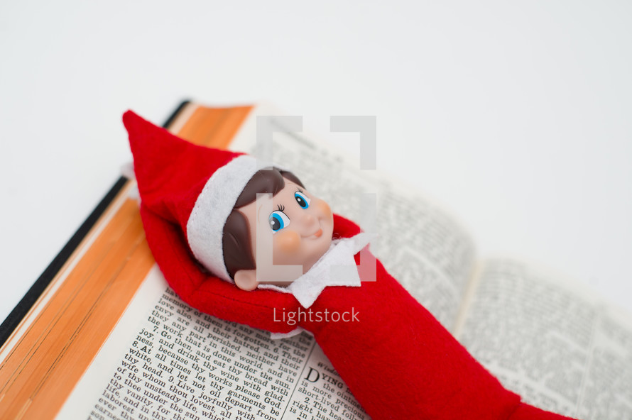 elf on a shelf on a Bible 