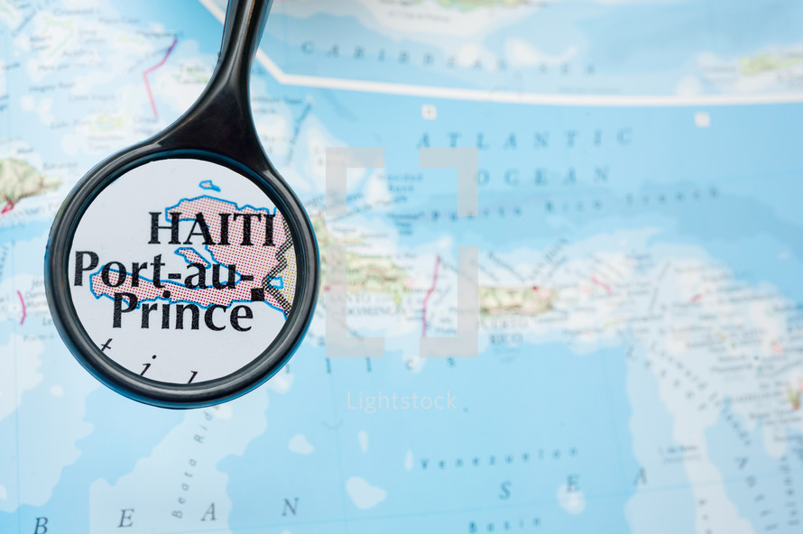 magnifying glass over a map of Haiti 