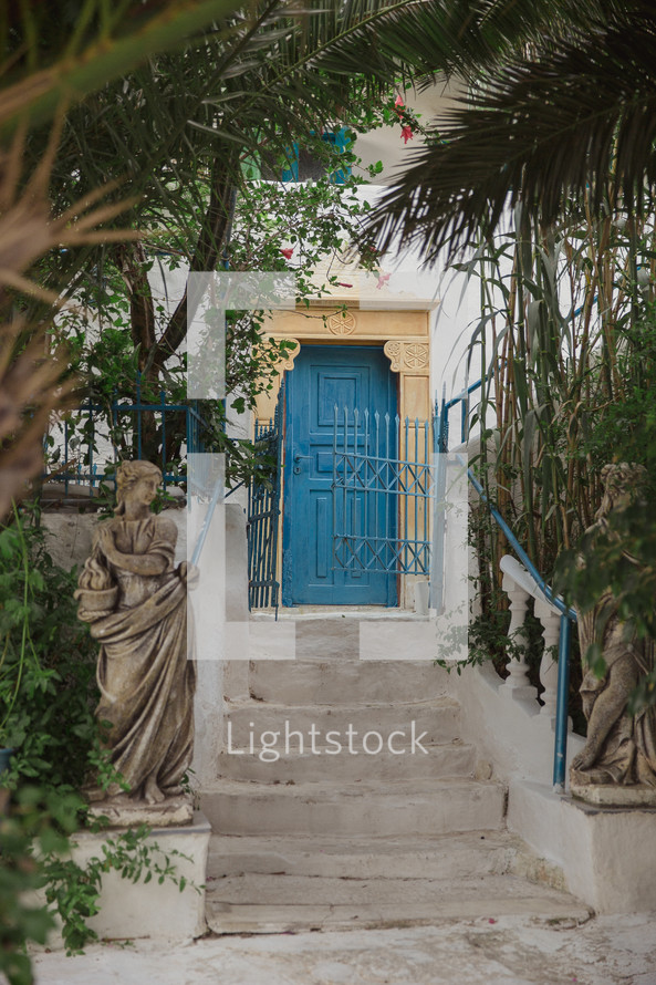 steps and blue door in Greece 