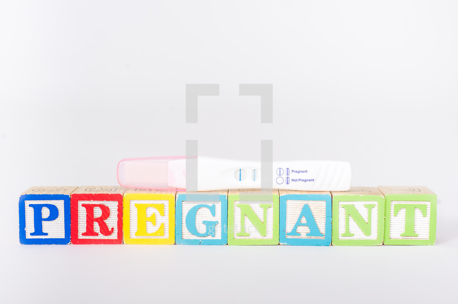 pregnant blocks and a positive pregnancy test 