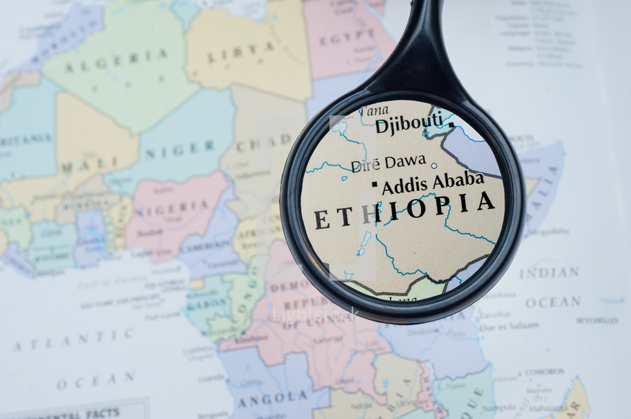 magnifying glass over a map of Ethiopia 