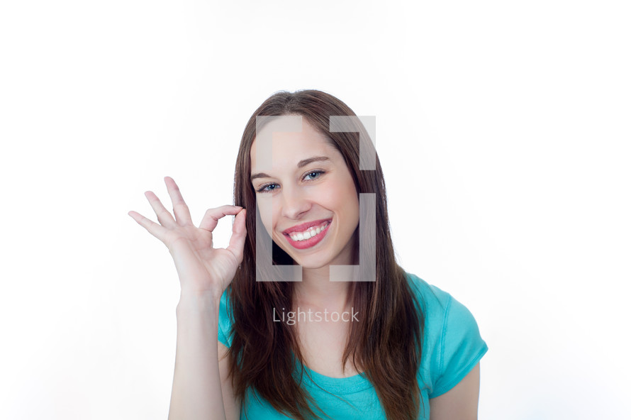 woman giving the ok sign