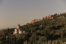 church and houses on a hillside in Italy