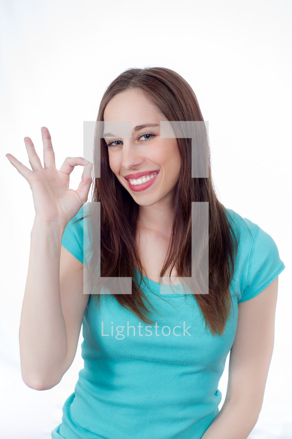 woman giving the ok sign