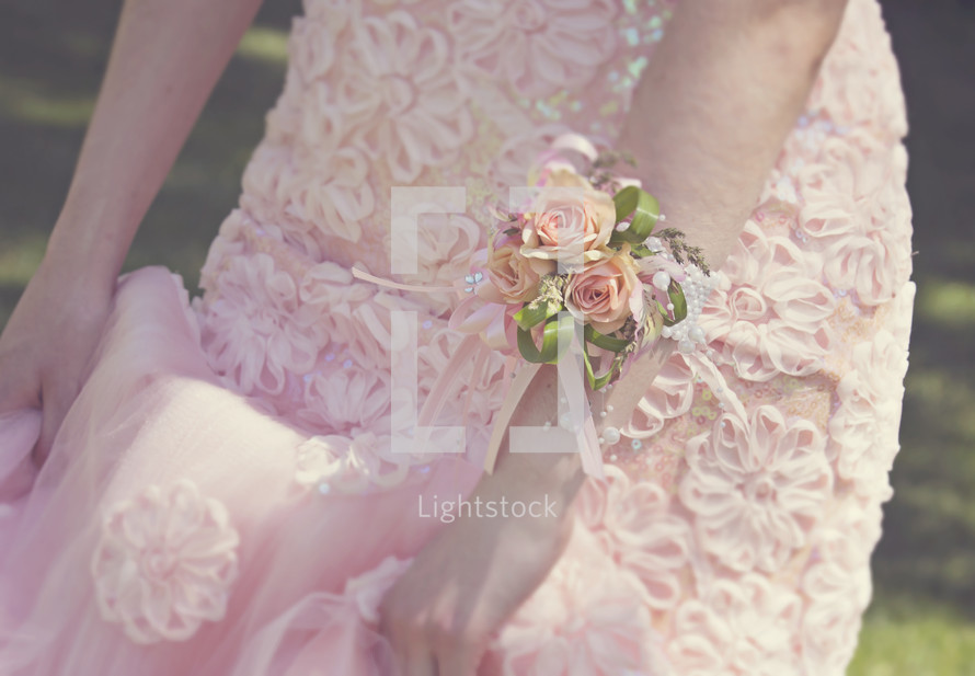 a beautiful floral graduation dress and flower