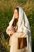 pregnant Mother Mary in prayer
