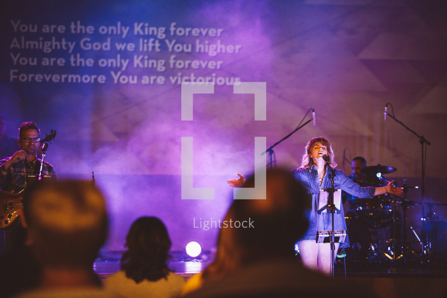 songs on a projection screen during a worship service 