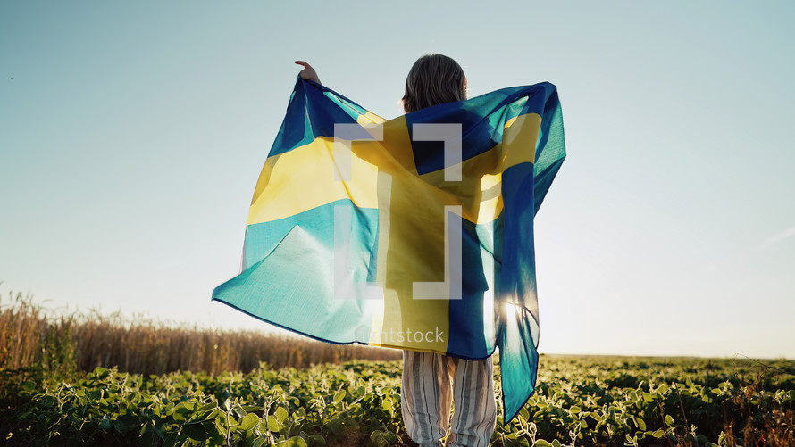 Boy with Swedish flag