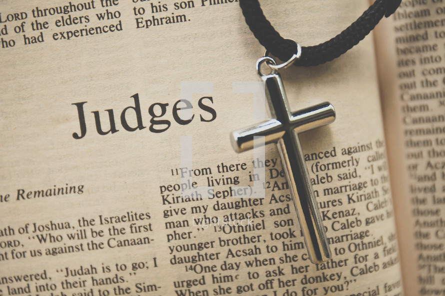 Judges and a cross necklace 