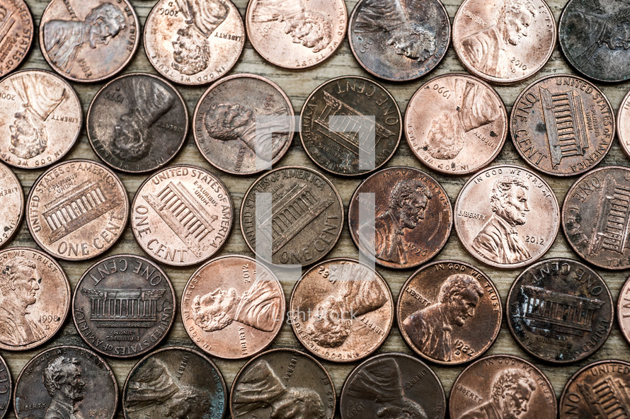 pennies lined up on a table