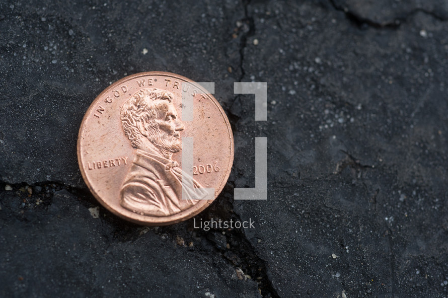 penny on asphalt