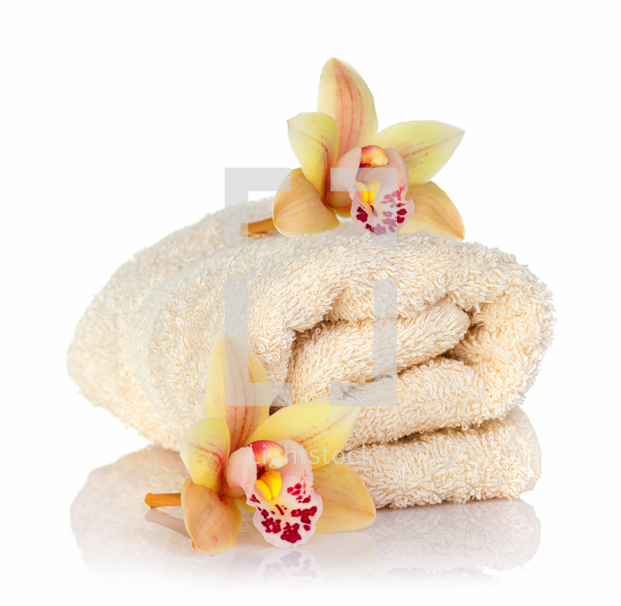 orchid flowers and towels 