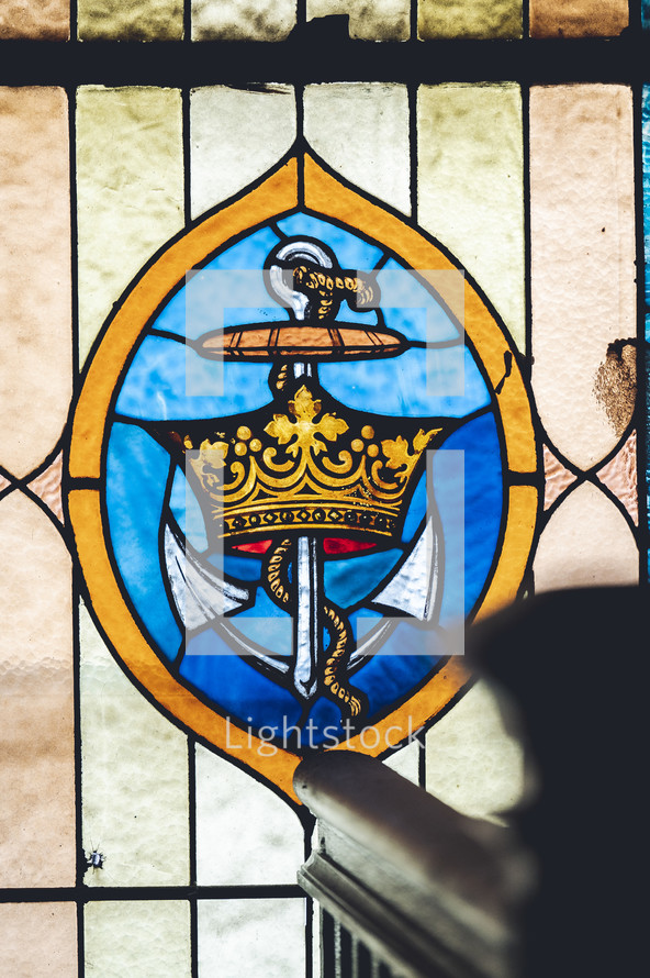 stained glass window of crown and anchor 