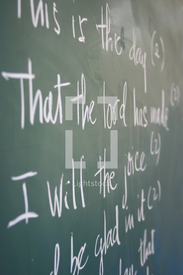 Scripture written on chalkboard