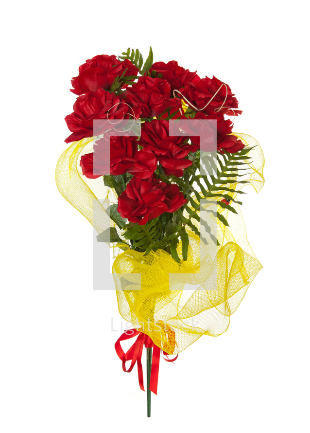 Artificial bunch of red roses made of synthetic fiber on white background