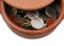 Small ceramic pot full of Euro coins