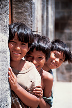 Three little boys smiling {Also try search for 'Ethnic Faces'} 