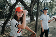teens on a baseball field 
