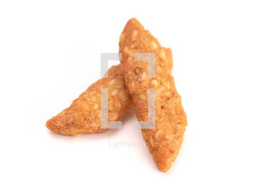 Cheddar Cheese Sesame Sticks on a White Background