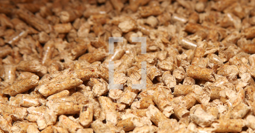 Wood pellets forming a background pattern