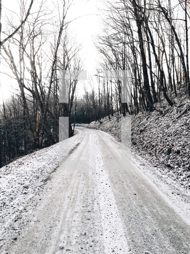 snow on a dirt road 