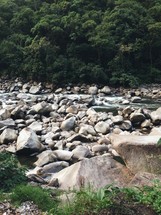 rocks along a river bank