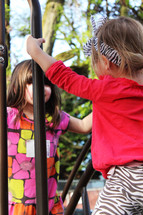Girls playing on the playground.