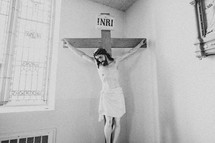 Realistic crucifix in the corner of a church.