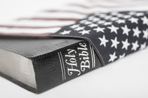 Holy Bible wrapped in an American flag.
