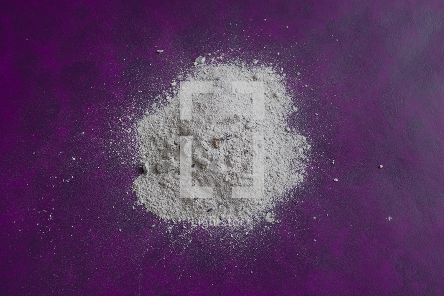 pile of ashes on purple 