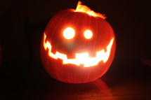 candle in a jack-o-lantern