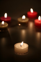 flames on votive candles 