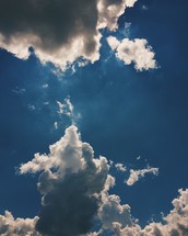 sunlight and clouds in a blue sky 