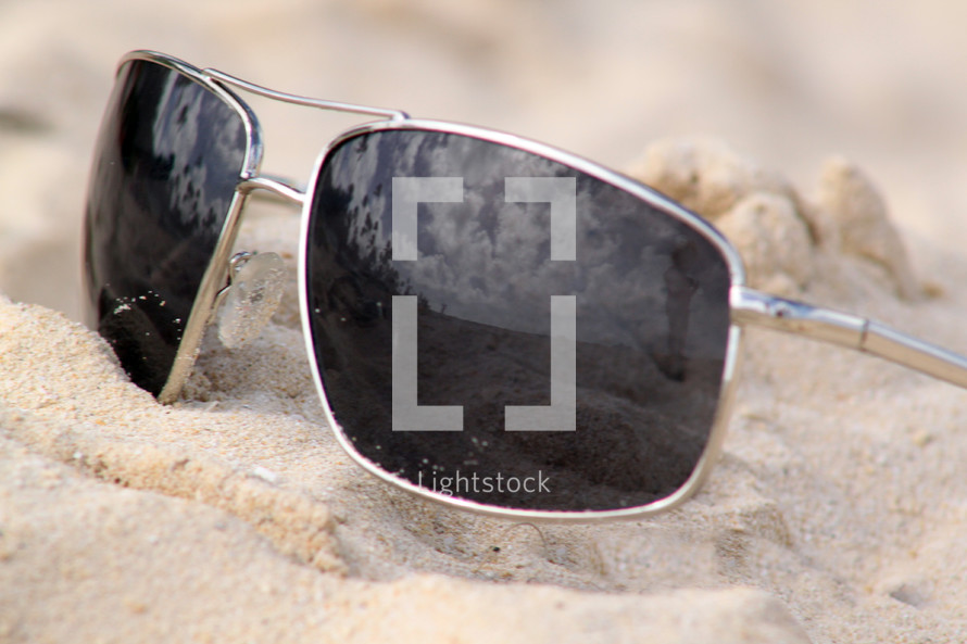 sunglasses in the sand 