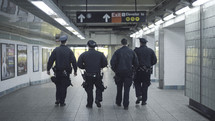 police officers in a subway 