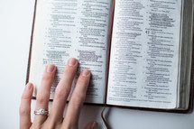 woman remind a Bible 