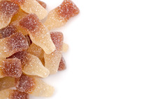 Sweet and Sour Gummy Cola Bottles on a White Background