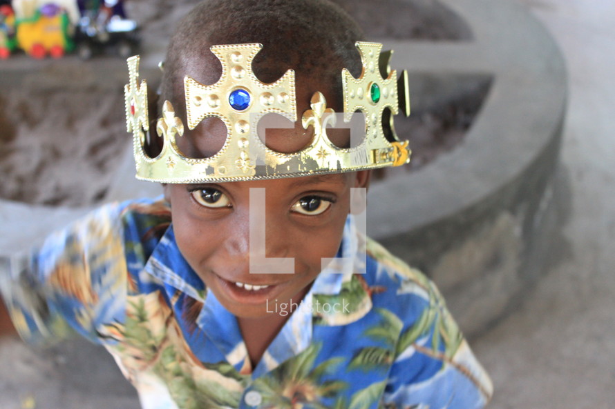 boy child wearing a crown
