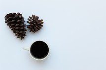 pine cones and coffee mug 