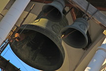 Church bells in a bell tower.