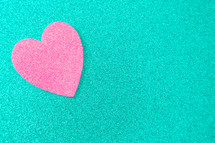 pink heart on teal 