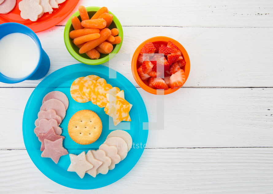 Healthy Lunch for Children on Bright Plates