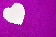 white heart cutout on purple 