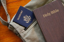 Mission trip, passport, sling bag and Bible 