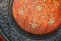 Oriental brass inlaid carved wooden table top