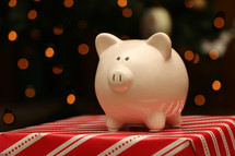piggy bank on a Christmas present 