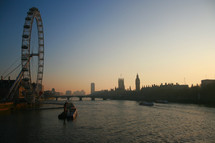 London River Thames and ferris wheel at dusk 