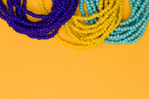 blue, yellow, and turquoise beads 
