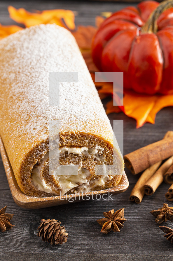 Pumpkin Spice Roll with Cream Cheese Frosting and Powdered Sugar