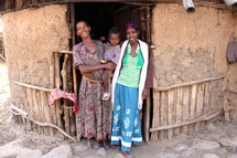 women in a hut in Africa 
